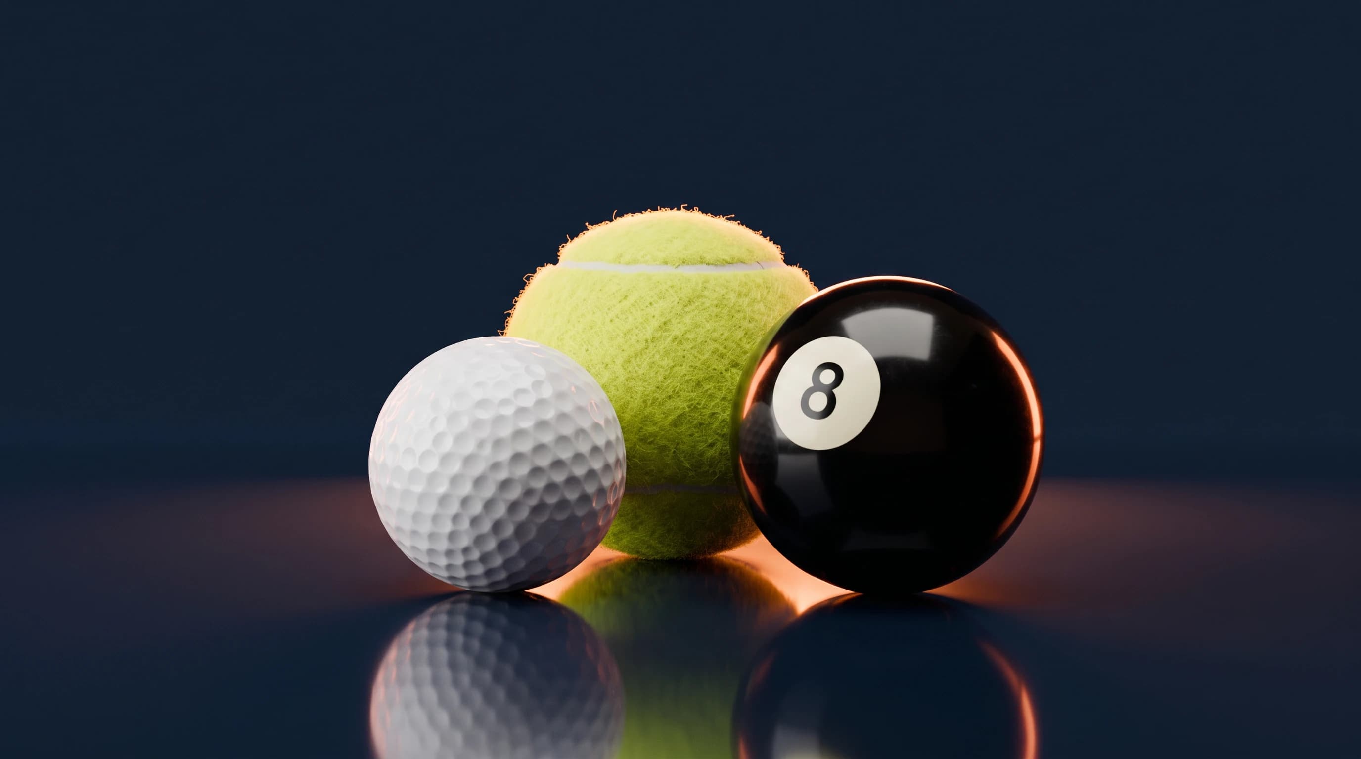 Une balle de golf, une balle de tennis et une boule de billard noire numéro 8 réunies sur un fond bleu nuit